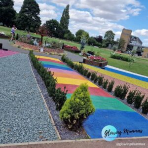 A beautiful rainbow path to celebrate rainbow baby day in Scunthorpe Central Park. Has the Glowing Mummas logo in the bottom right hand corner.